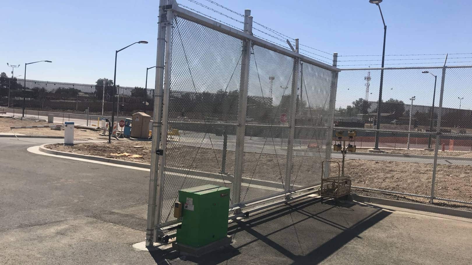 Automated gate with control panel.
