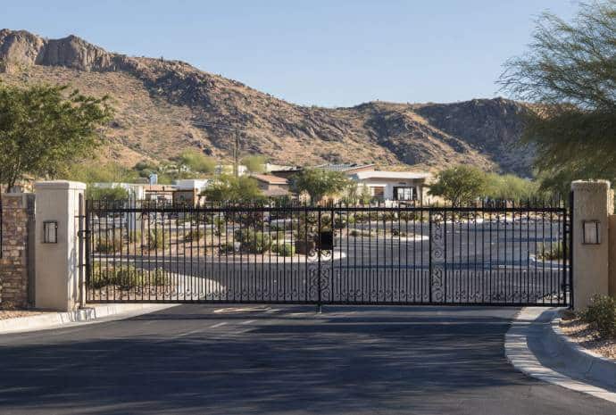 Black gate with mountain backdrop