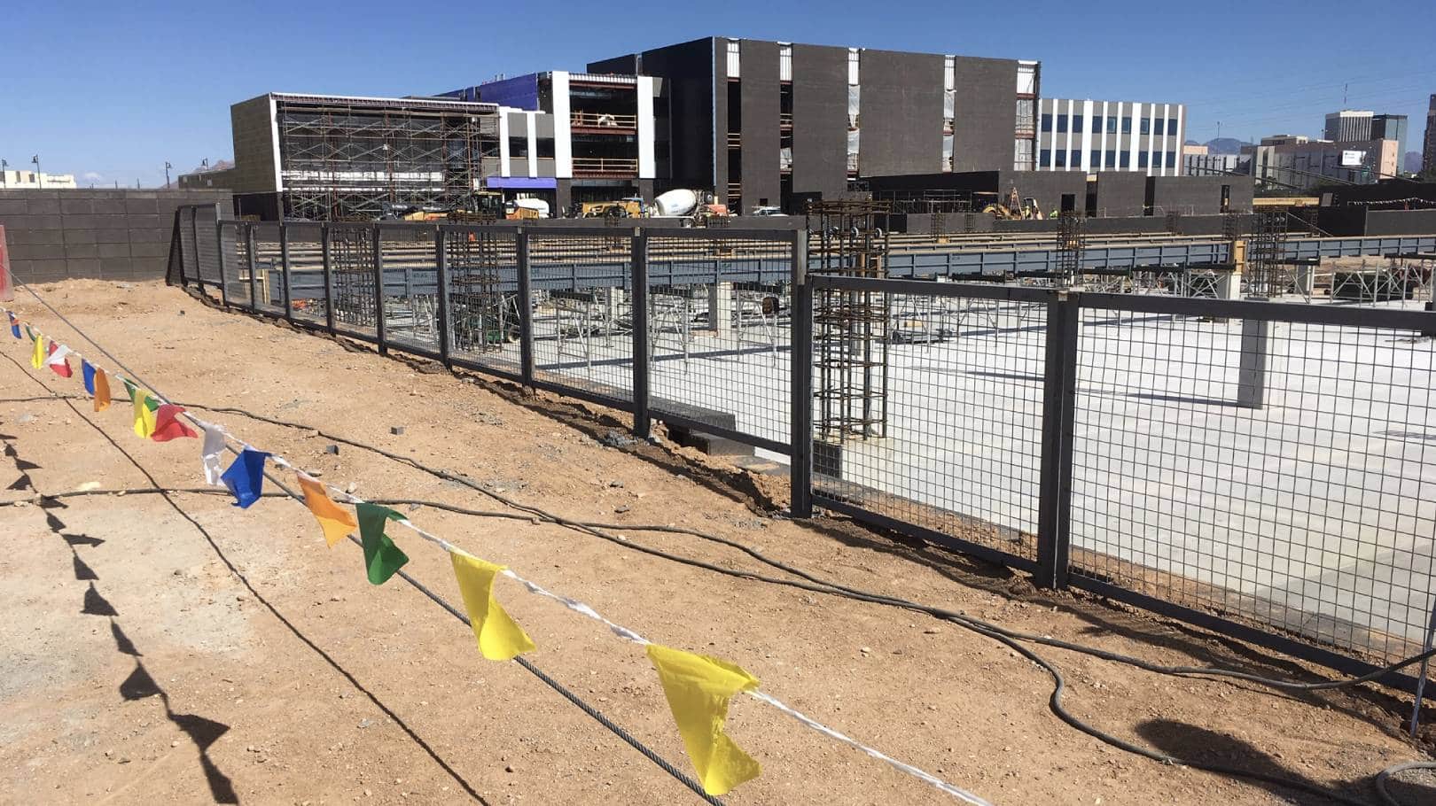 metal-fabrication-main Construction site with colorful flags